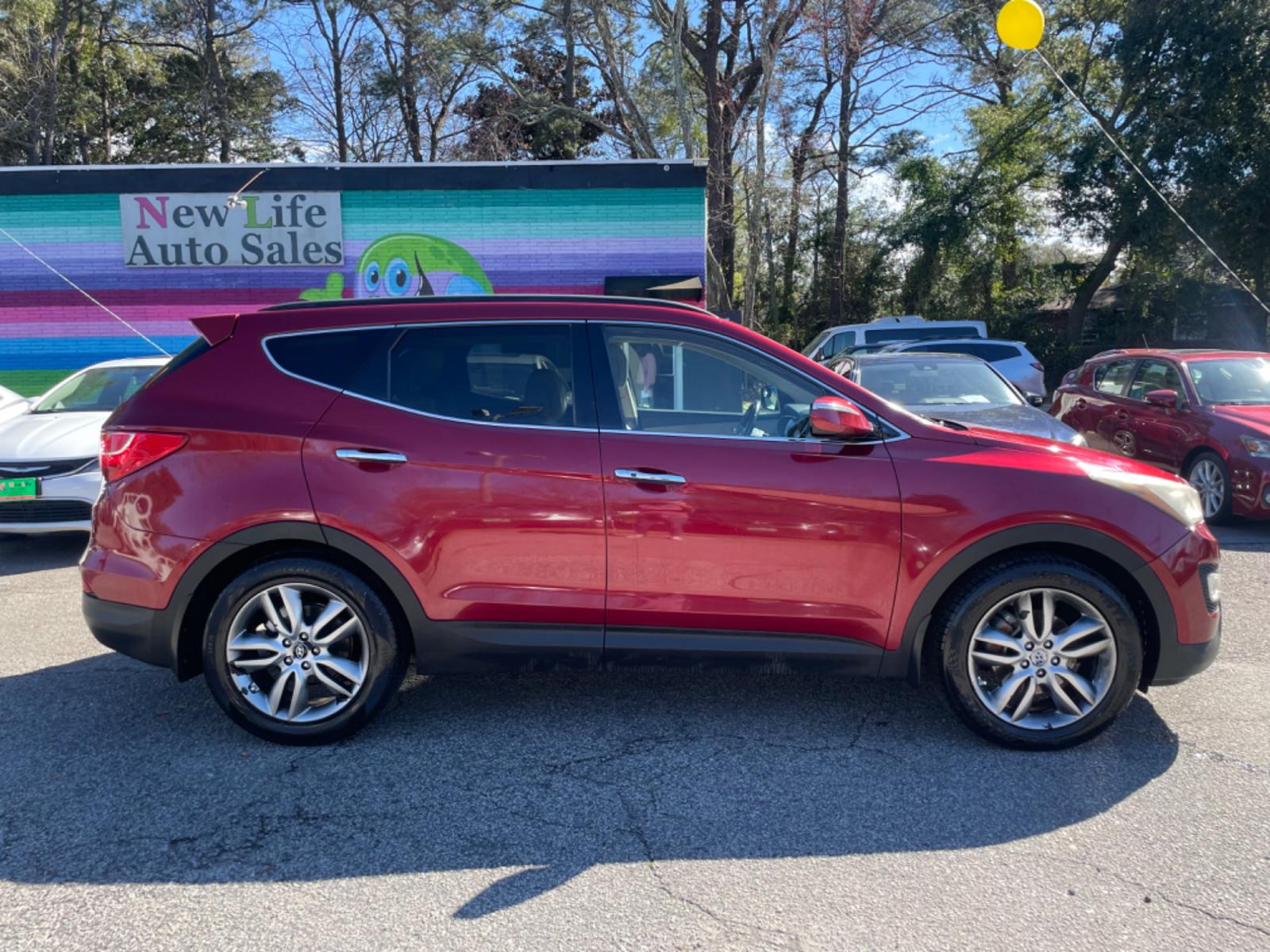 2013 RED HYUNDAI SANTA FE SPORT 2.0T (5XYZU3LA3DG) with an 2.0L engine, Automatic transmission, located at 5103 Dorchester Rd., Charleston, SC, 29418-5607, (843) 767-1122, 36.245171, -115.228050 - Leather, CD/AUX/Sat/Bluetooth, Dual Climate, Power Everything (windows, locks, seats, mirrors), Heated Seats, Rear Heated Seats, Push Button Start, Keyless Entry, Alloy Wheels. Local Trade-in!! Located at New Life Auto Sales! 2023 WINNER for Post & Courier's Charleston's Choice Pre-owned Car Dealer - Photo #7